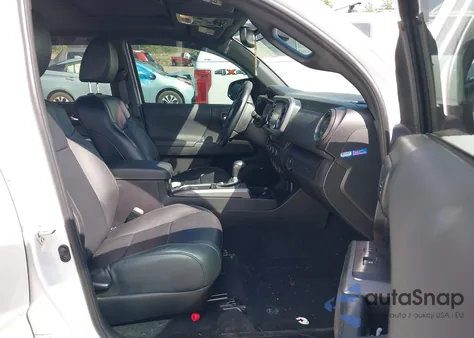 2023 Toyota Tacoma Trd Off Road from USA, damaged, VIN 3TYCZ5AN9PT128288